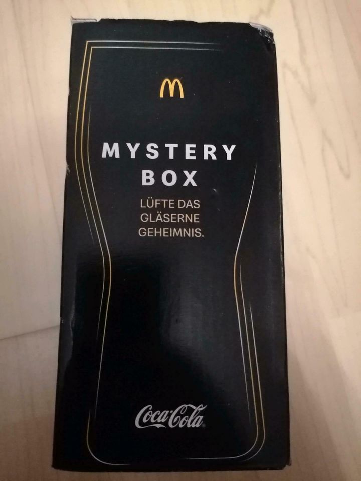 Mystery Box Coca Cola Glas schwarz MC Donalds in Niederkassel