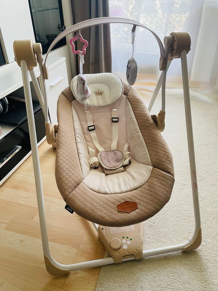 KIDIZ elekt. Babyschaukel beige 5 Geschwindigkeiten, Sound, USB! in Erding