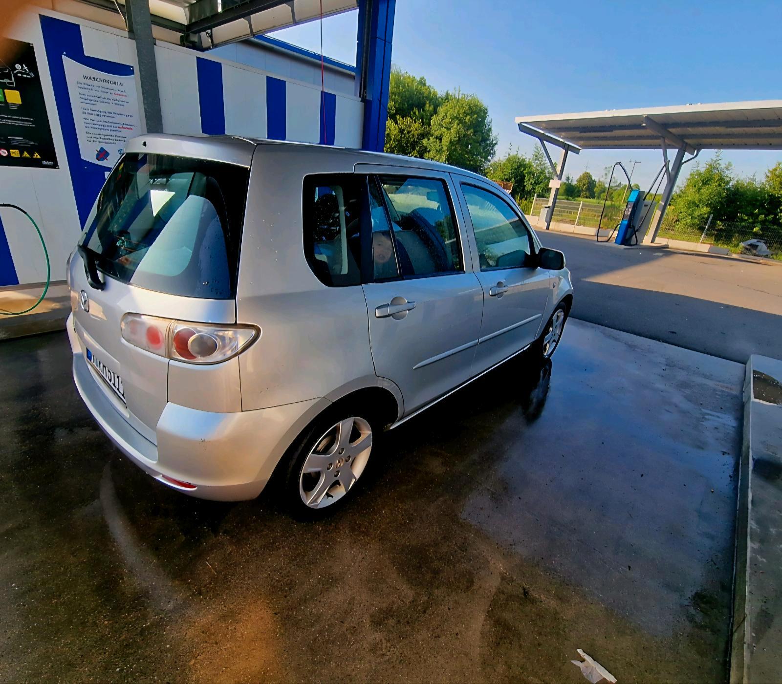 Abbildung des Autos Mazda 2 2006. Klima