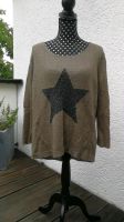 Olive  Pulli mit schwarzen Glitzer Stern Rheinland-Pfalz - Unnau Vorschau