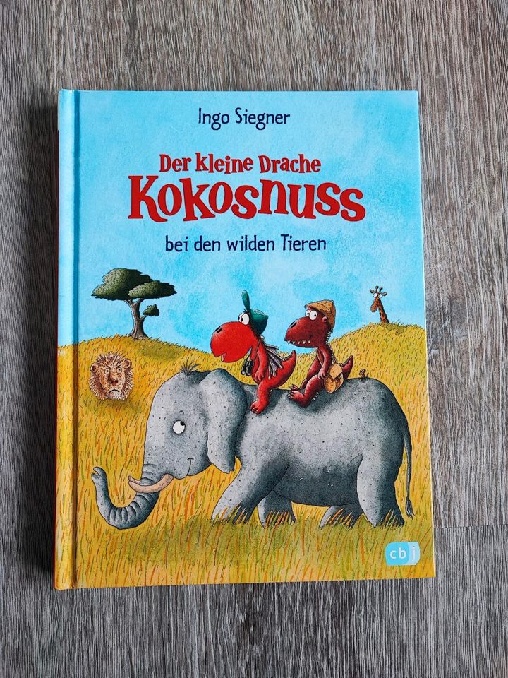 Buch der kleine Drache Kokosnuss bei den wilden Tieren wie Neu!! in Lüneburg
