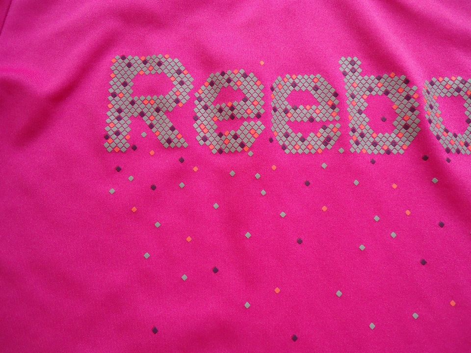 Reebok Sportshirt Shirt Mädchen Gr. 152 in Schortens