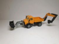 Siku MB Unimog mit Greifarm und Schaufel 1/55 gebraucht Bochum - Bochum-Wattenscheid Vorschau