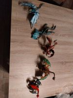 5 Schleich Drachen Figuren Wilderer Taucher Rammbock roter blauer Rheinland-Pfalz - Habscheid Vorschau