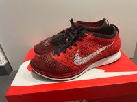 Original Nike Flyknit Racer 42,5 Rot Schwarz Baden-Württemberg - Bad Friedrichshall Vorschau