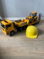 Bruder MAN TGA Tieflader mit JCB 4CX Baggerlader Bagger + Helm Brandenburg - Potsdam Vorschau