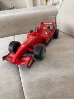 Formel 1 Spielzeugauto(mit Sound) Hessen - Linden Vorschau