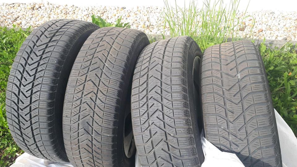 Winterreifen 185 / 60 R15 88T M+S mit Opel Radkappen in Jena