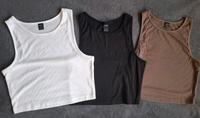 Paket 3 Tops Größe S Mädchen schwarz weiß braun Sachsen - Weinböhla Vorschau