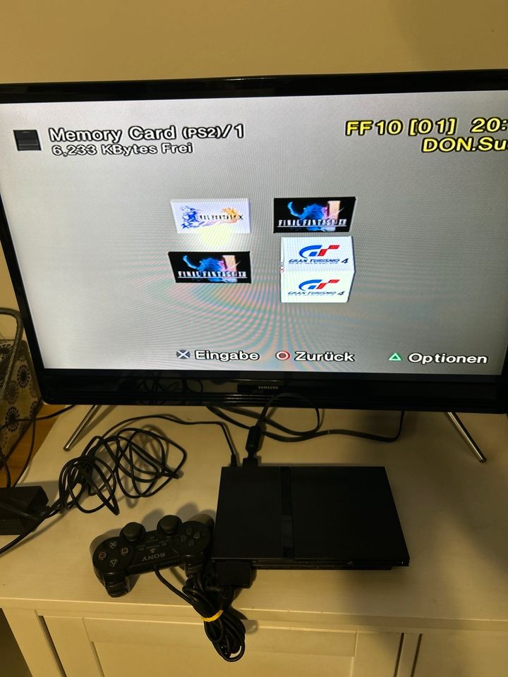 Sony PS2  slim mit 4 spielen in Rödermark