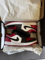 Jordan 1 Low Bred Toe Größe 42.5 553558-612 | NEU Schleswig-Holstein - Osterrönfeld Vorschau