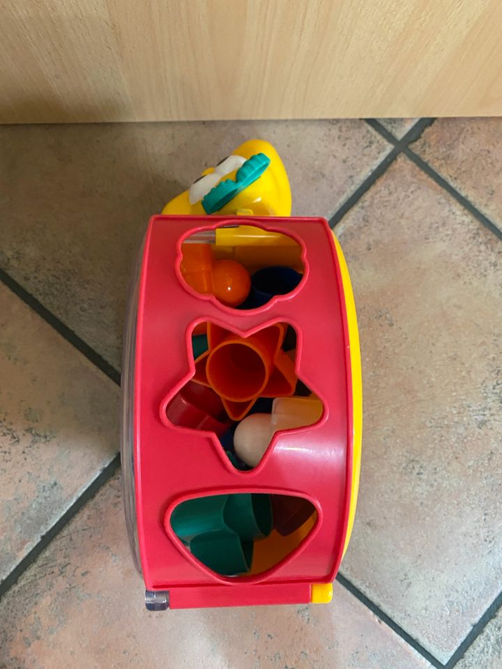 Fisher Price Musikschnecke inkl. Stapelsteinen in Niddatal