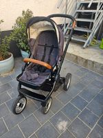 Kinderwagen/ Buggy mit Fußsack aus Schafsfell und Regenschutz Baden-Württemberg - Birkenfeld Vorschau