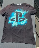 2 Shirts Gr. 146/152,  Playstation und Tarnfarben Quedlinburg - Bad Suderode Vorschau