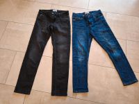 Jeans in schwarz und dunkelblau Gr 140 Niedersachsen - Sittensen Vorschau