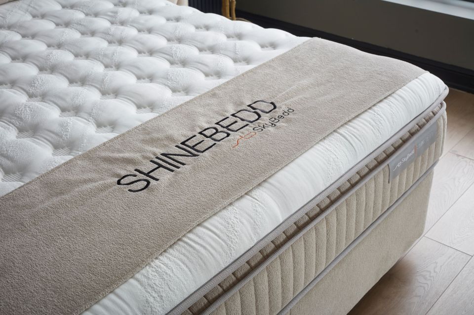 Boxspringbett "Shine" Creme inkl. Matratz, Stauraum in Großheubach