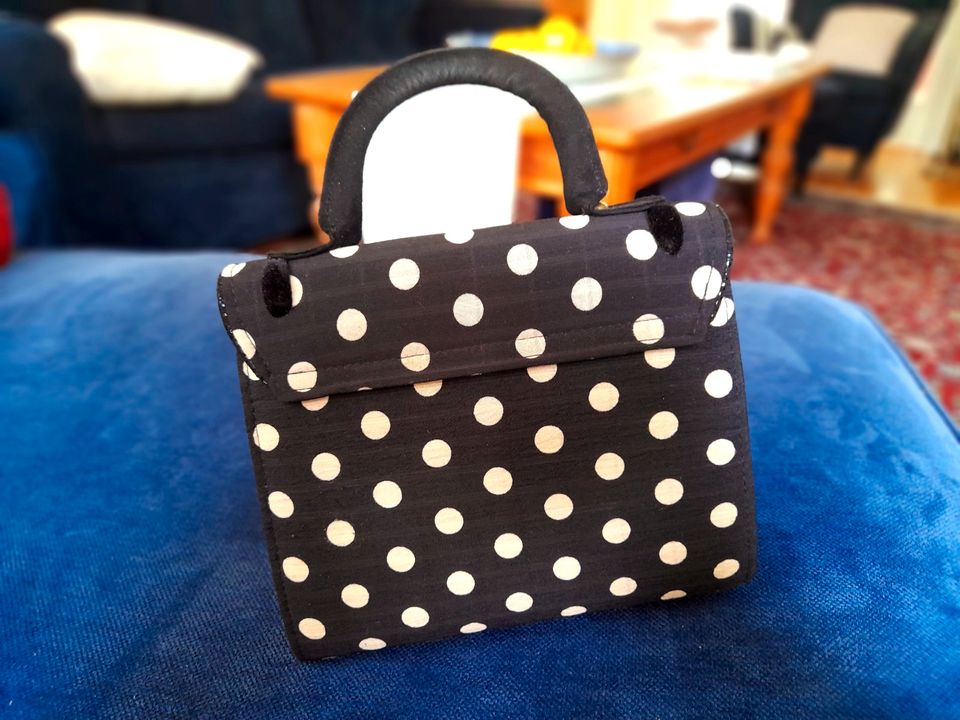 Ruby Shoo 50s Santiago Handbag in Black Spots in Bonn