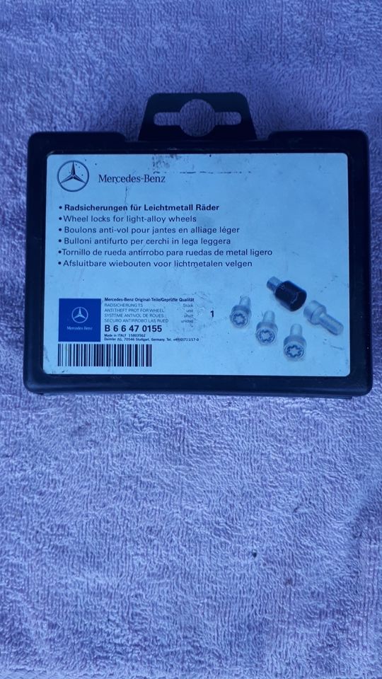 Mercedes Radsicherungen Leichtmetalräder B66470155 in Stein