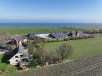 Immobilienensemble mit viel Potenzial an der Steilküste in Strande Schleswig-Holstein - Strande Vorschau