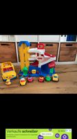 Parkhaus Fisher Price mit Bus und Autos Abschlepper Spielzeug Nordrhein-Westfalen - Dülmen Vorschau