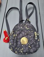 Kipling putziger Mini Rucksack Tasche 22/22/11 schwarz/gold super Berlin - Reinickendorf Vorschau