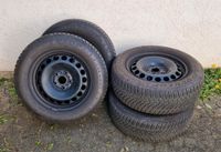 4 Winterreifen auf Stahlfelgen Dunlop 215/60R16 Baden-Württemberg - Eningen Vorschau