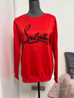 Hübscher roter Pullover mit schwarzer Schrift Niedersachsen - Seevetal Vorschau