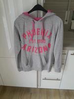 Grauer Pullover mit Kapuze und pinkener Aufschrift Gr. L Saarland - Wadgassen Vorschau