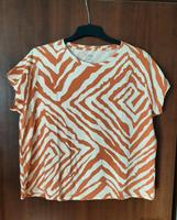 T-Shirt beige-orange Nordrhein-Westfalen - Siegburg Vorschau