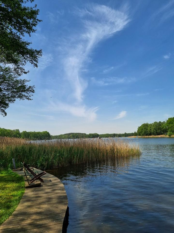 Ferienhaus am See mit Steg, Motorboot, E- Bikes, Paddelboote, SUP in Rheinsberg