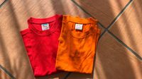 2 Shirts in Größe 122/128 in rot und orange Baden-Württemberg - Filderstadt Vorschau