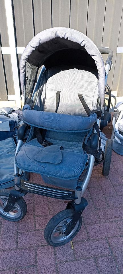 Auto Babyschale Maxi Cosi + Kinderwagen mutsy trans range in Bordesholm