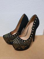 jumex high heels  schwarz gold Niedersachsen - Heidenau Vorschau