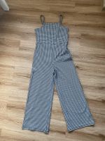 Cooler Jumpsuit Wide Leg 146/152 bis zum 08.06.24 Niedersachsen - Sassenburg Vorschau