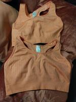 Neue Tchibo Sport BHs Lachsfarbe Gr.L 44/46 Nordrhein-Westfalen - Emmerich am Rhein Vorschau