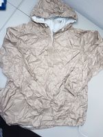 neuwertige Regenjacke von Quechua, XS/S beige Baden-Württemberg - Heiningen Vorschau