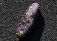 Edelstein - 1 Boulder Opal geschliffen schönes Multi Feuer 1,75ct Sachsen - Rochlitz Vorschau