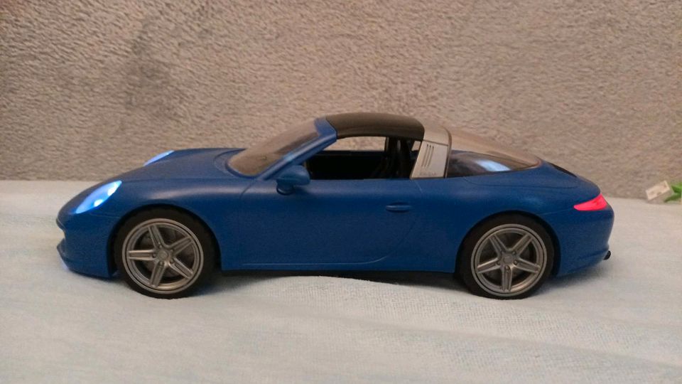 Playmobil Auto Porsche blau Verkaufsstand beleuchtet in Essen