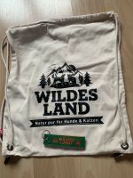 Wildes Land Fan Paket mit Turnbeutel und Anhänger Hund Nordrhein-Westfalen - Leopoldshöhe Vorschau