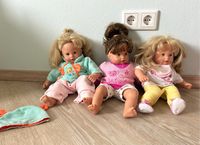 3 Puppen Spielzeug Kinderpuppen mit Klamotten Bekleidung Hessen - Neuhof Vorschau