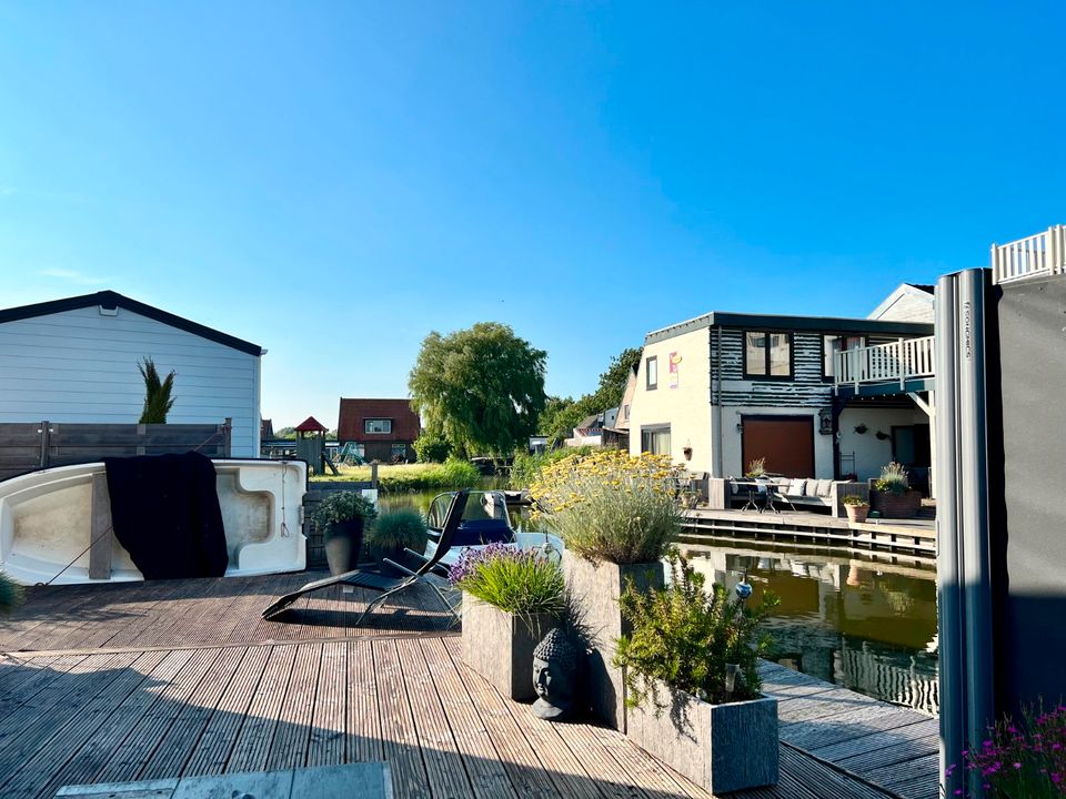 Ferienhaus mit Boot und Steg am Ijsselmeer, Holland, Niederlande in Aldenhoven