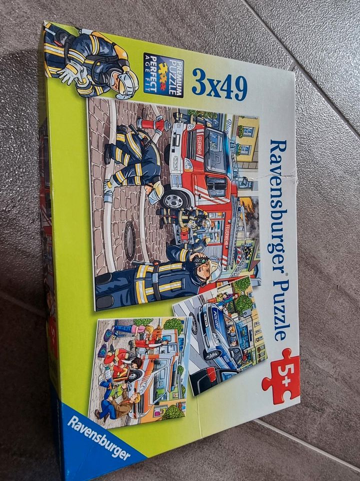 Ravensburger Puzzle Feuerwehr Polizei Krankenwagen 3 x 49 in Ochtrup