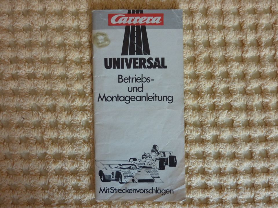 Carrera Universal Betriebs-und Montageanleitung mit Streckenvors. in Marburg