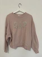GAP Pullover Rosa Gr. M mit Glitzeraufdruck Nordrhein-Westfalen - Vlotho Vorschau