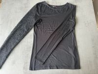 Shirt im asymmetrischem Look und Spitzen-Ärmel, schwarz, Gr.36 Nordrhein-Westfalen - Kerpen Vorschau