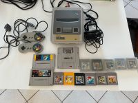 Super Nintendo SNES mit 2 Controller, Adapter und 2+12 Spielen Baden-Württemberg - Gaiberg Vorschau