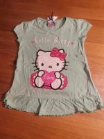 Kinder T-Shirt grün hello Kitty Größe 104 Nordrhein-Westfalen - Plettenberg Vorschau