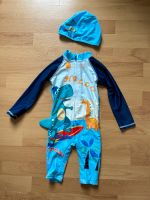Baby Schwimmanzug mit Badekappe Größe 74-80 Friedrichshain-Kreuzberg - Kreuzberg Vorschau