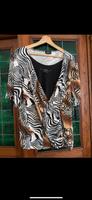 Vintage Bluse luftig Tiger Muster Gr.L Berlin - Reinickendorf Vorschau