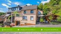 Echtes Wohlfühlambiente: Gemütliches Zweifamilienhaus  mit Kamin und einladender Atmosphäre Rheinland-Pfalz - Burgschwalbach Vorschau